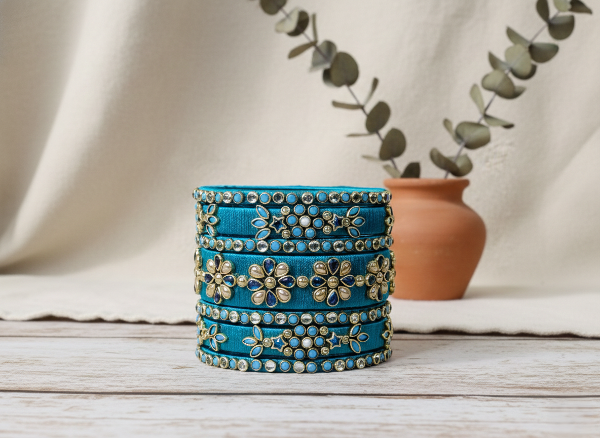 Royal Teal Silk Thread Bangle Set with Intricate Kundan Floral Embellishments