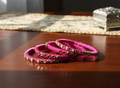 Handcrafted Magenta Silk Thread Bangles with Kundan-Style Accents (Set of 4)