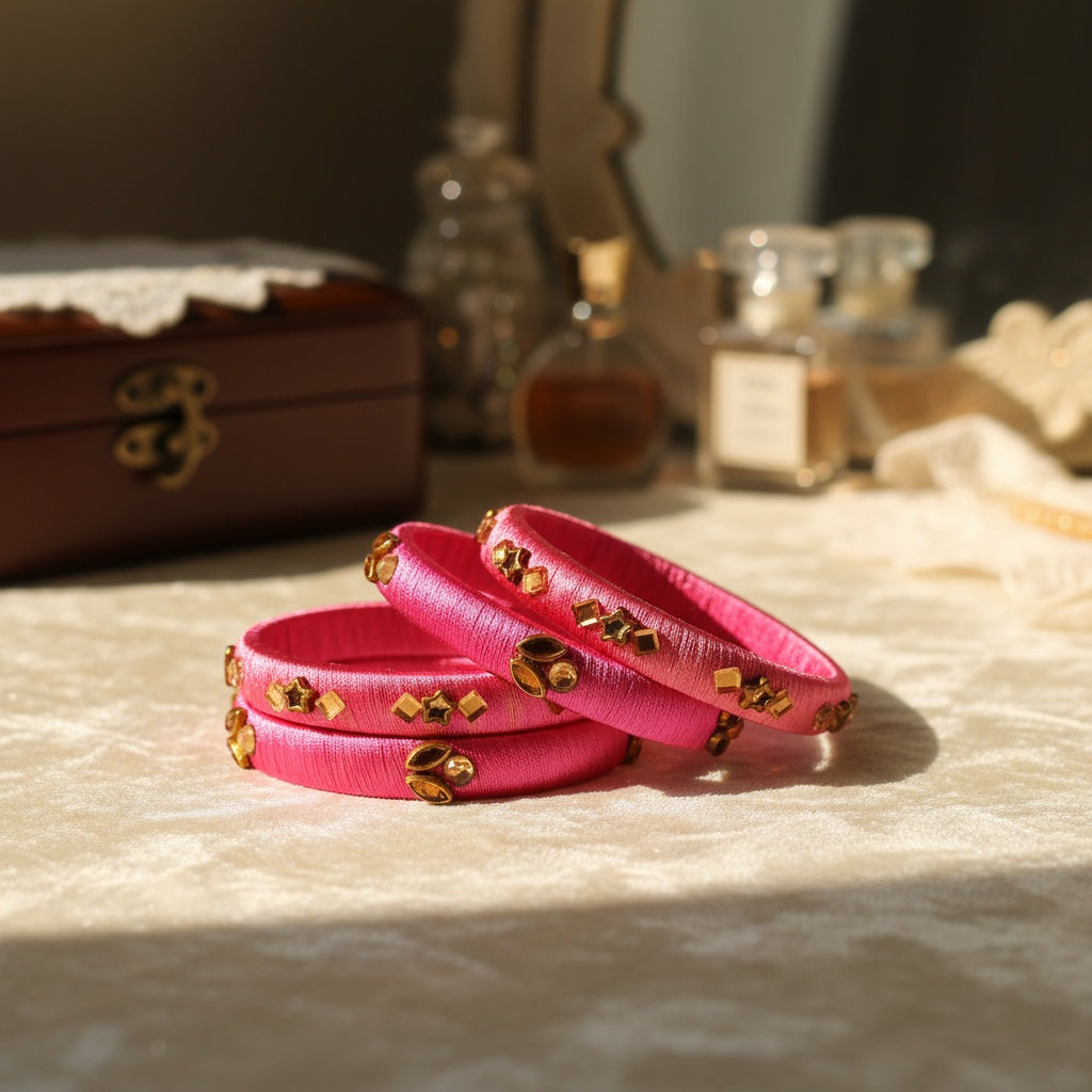 Vibrant Fuchsia Silk Thread Bangles with Gold Kundan Accents